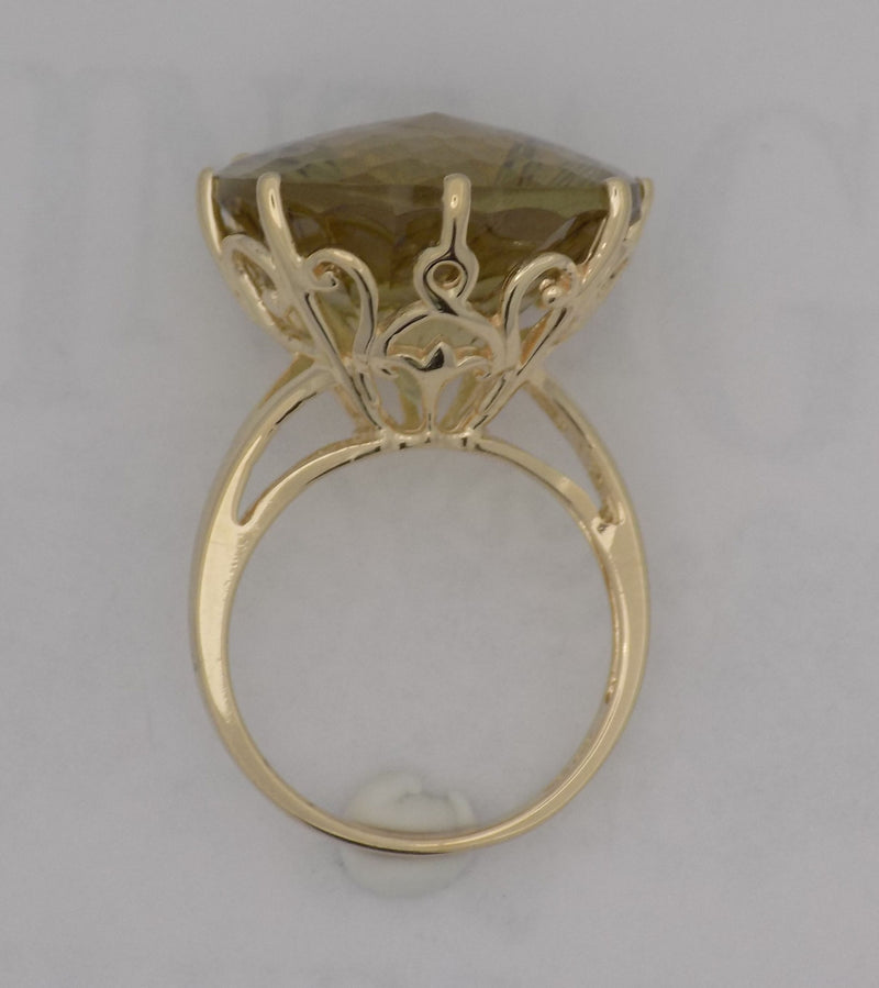 Yellow gold round lemon citrine fantasy cut ring.