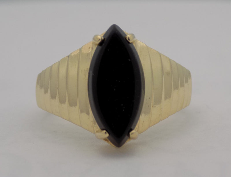 Yellow gold estate marquise shaped onyx ring.