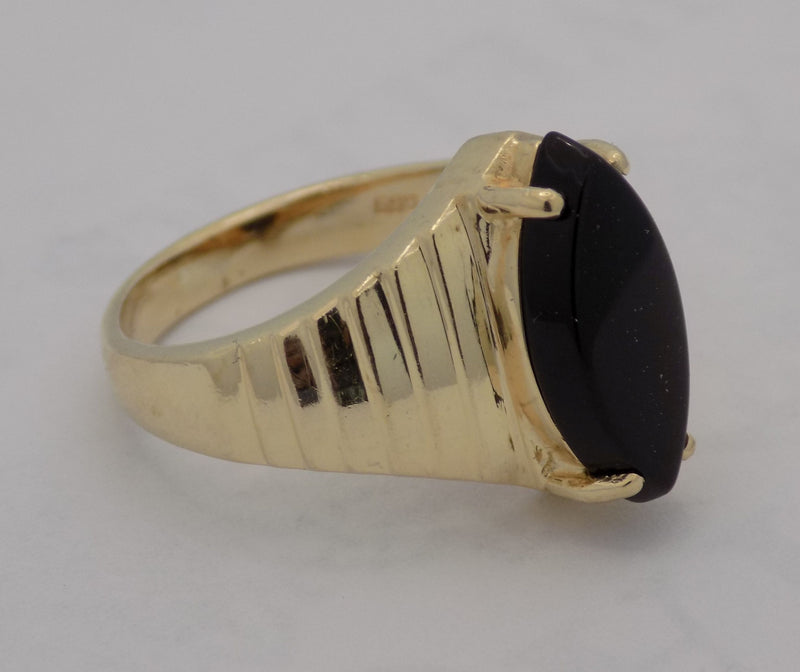 Yellow gold estate marquise shaped onyx ring.