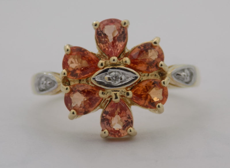 Yellow gold pear shaped topaz and diamond ring.