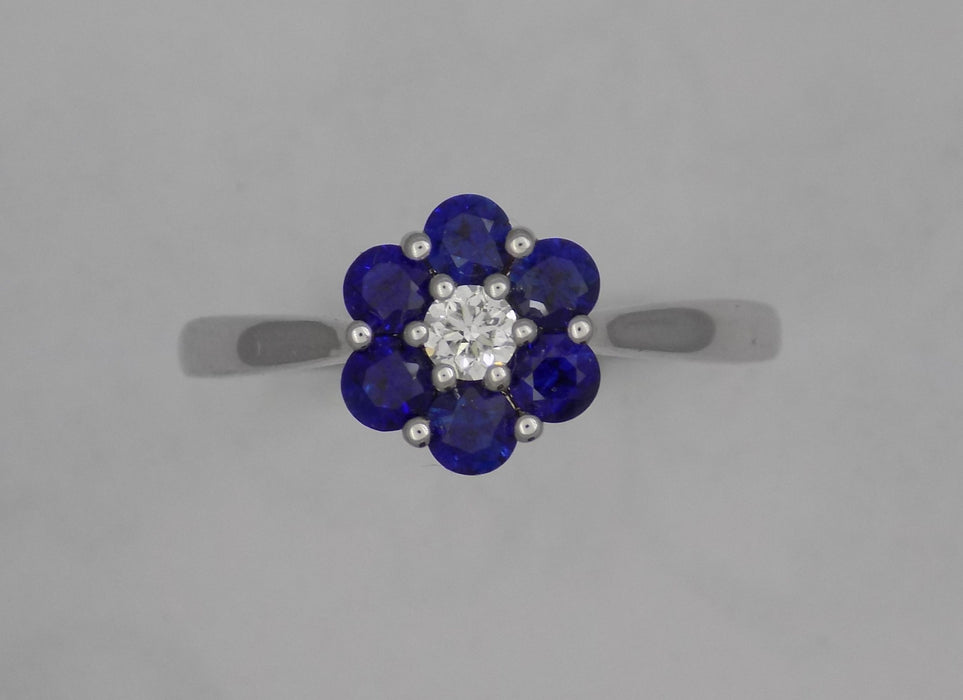 White gold blue sapphire and diamond ring.