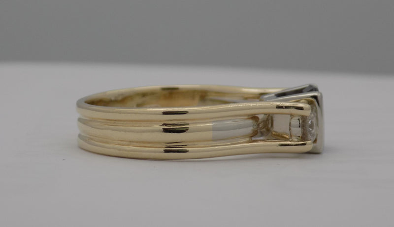 Sapphire and diamond three stone ring.