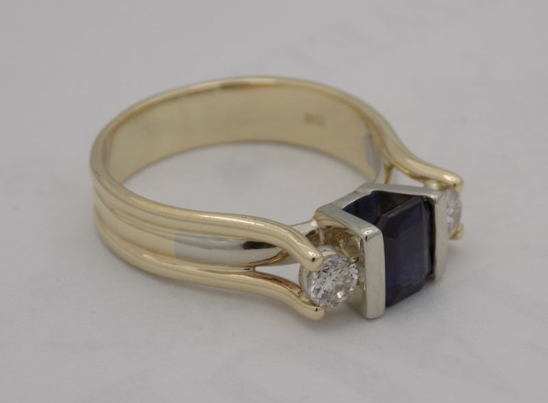 Sapphire and diamond three stone ring.