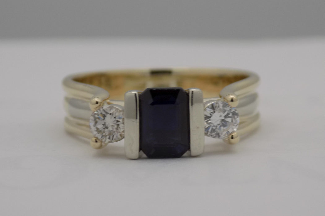 Sapphire and diamond three stone ring.