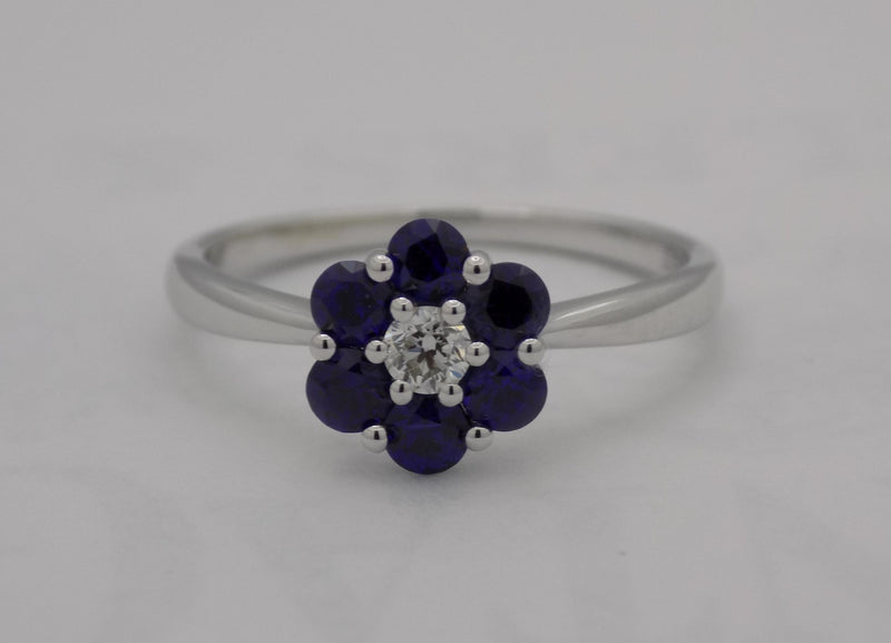 White gold blue sapphire and diamond ring.