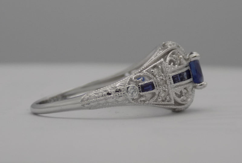 White gold filigree diamond and sapphire ring.