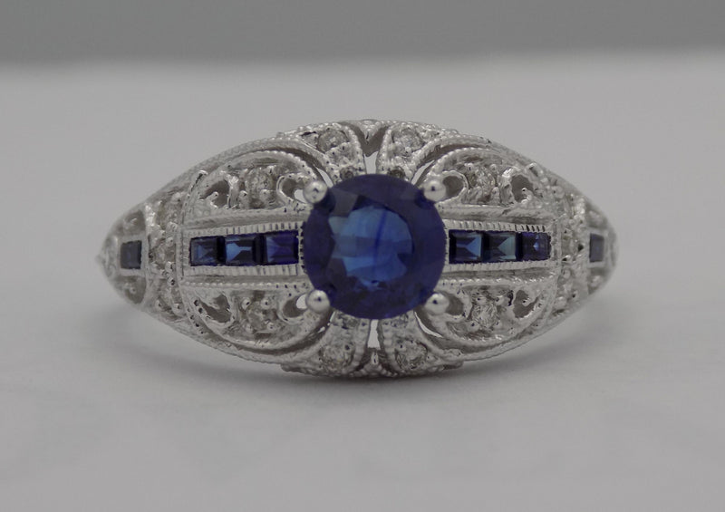 White gold filigree diamond and sapphire ring.