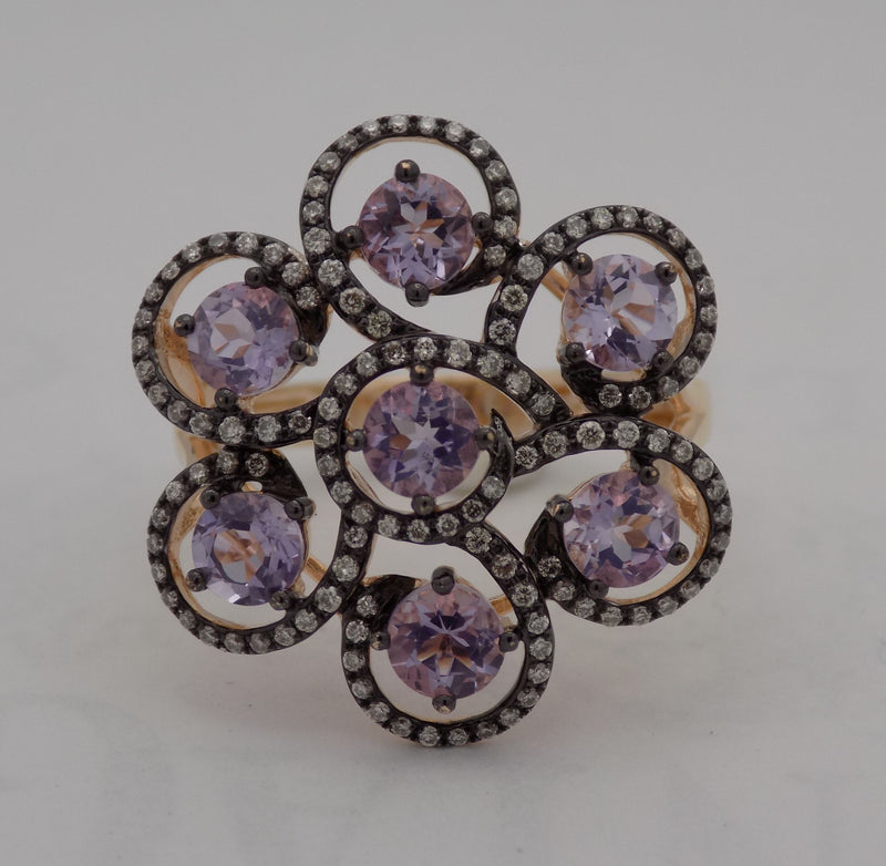 Rose gold amethyst and diamond swirl ring.
