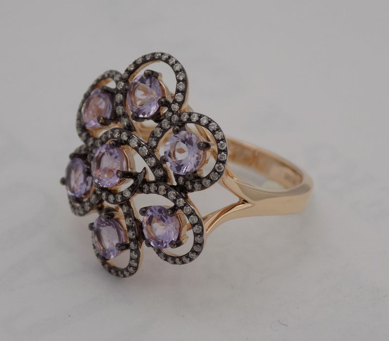 Rose gold amethyst and diamond swirl ring.