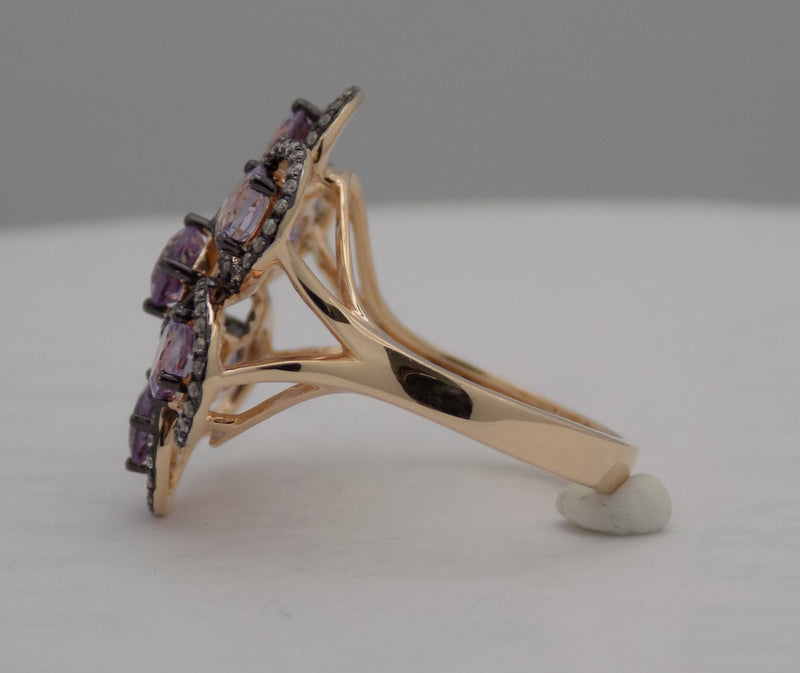 Rose gold amethyst and diamond swirl ring.