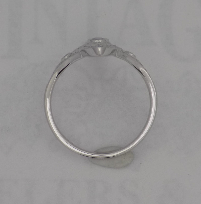 White gold diamond and sapphire ring