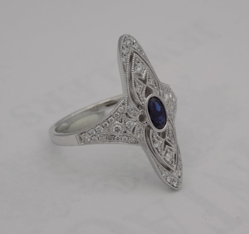 White gold diamond and sapphire ring