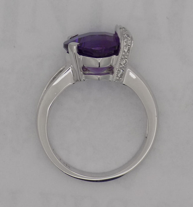 White gold cushion shaped amethyst and diamond ring