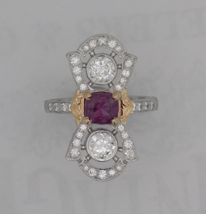 White gold/Rose gold diamond and pink sapphire ring.