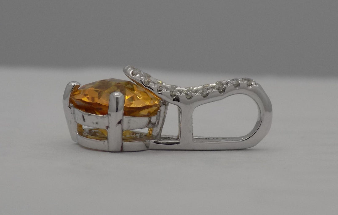 White gold citrine with diamond bale pendant.