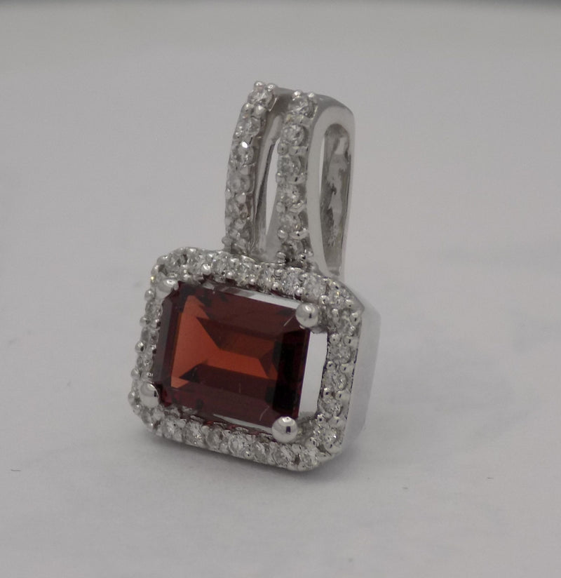 White gold garnet halo diamond style pendant