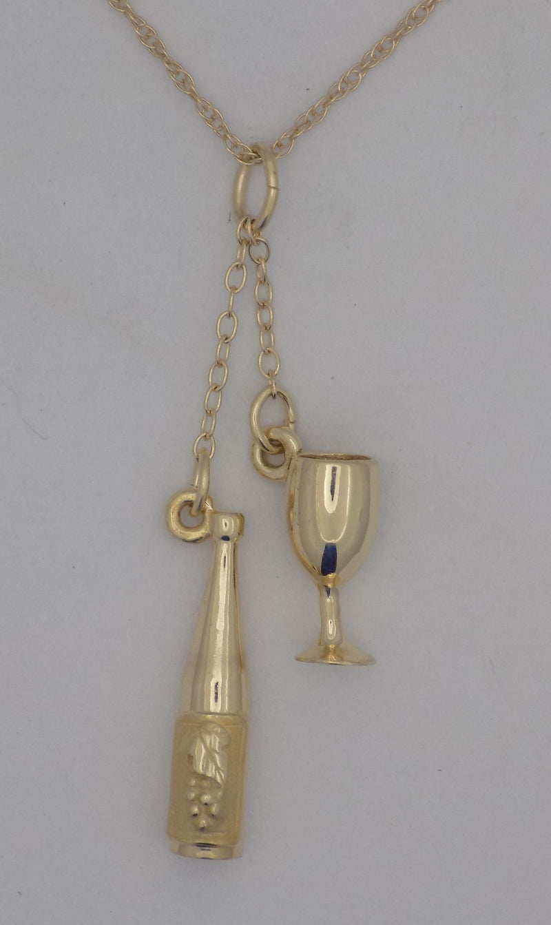 Wine bottle and glass 14ky pendant.