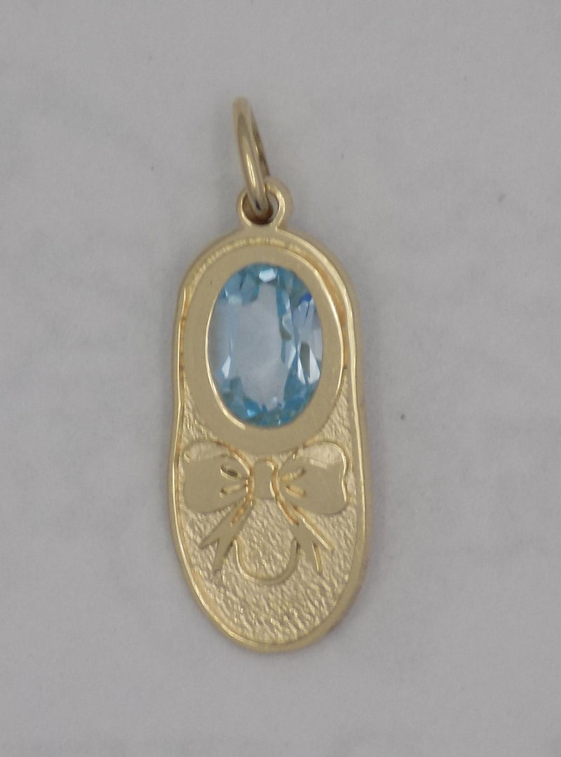 Yellow gold birthstone shoe charm.
