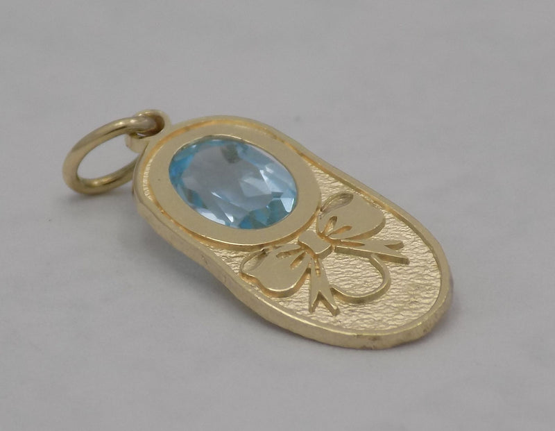 Yellow gold birthstone shoe charm.