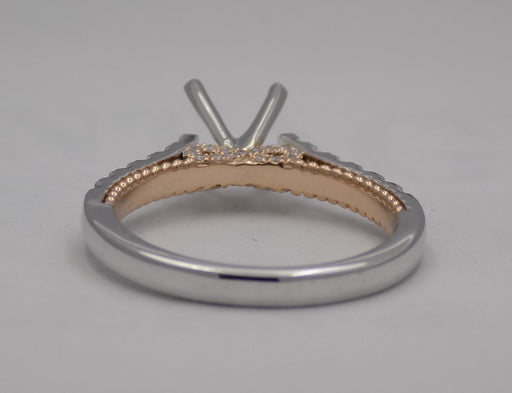 14 karat two-tone, white and rose gold diamond semi-mount engagement ring with infinity design, back view.