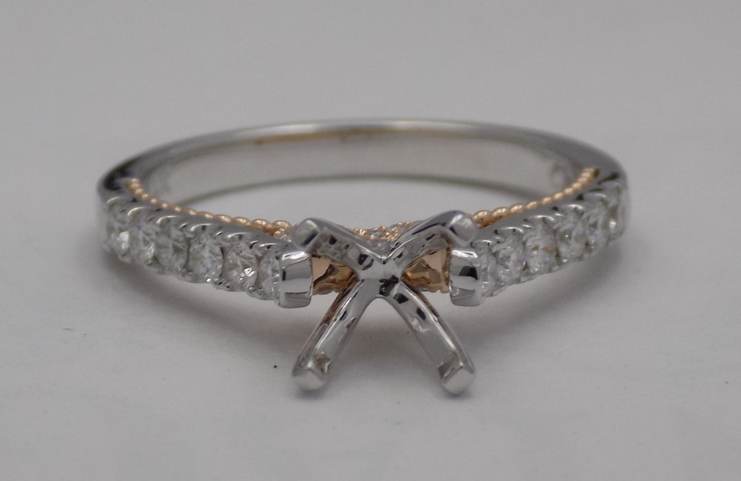 14 karat two-tone, white and rose gold diamond semi-mount engagement ring with infinity design, view of top.