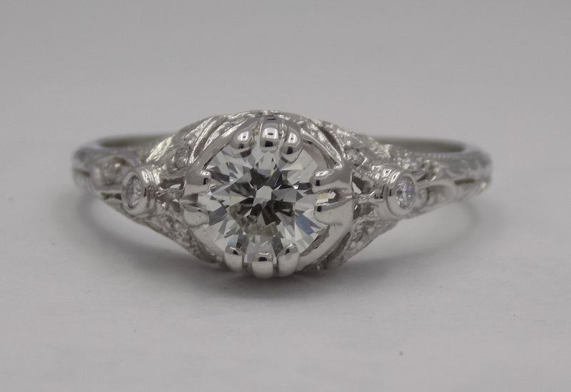 White gold filigree diamond wedding set.