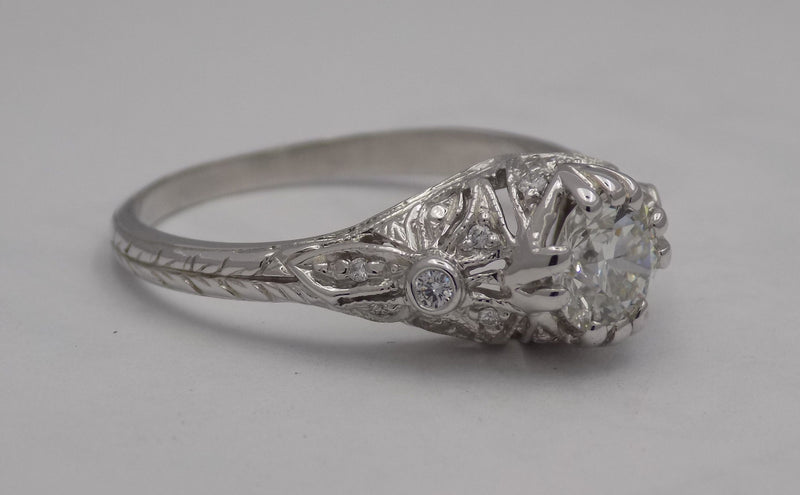 White gold filigree diamond wedding set.
