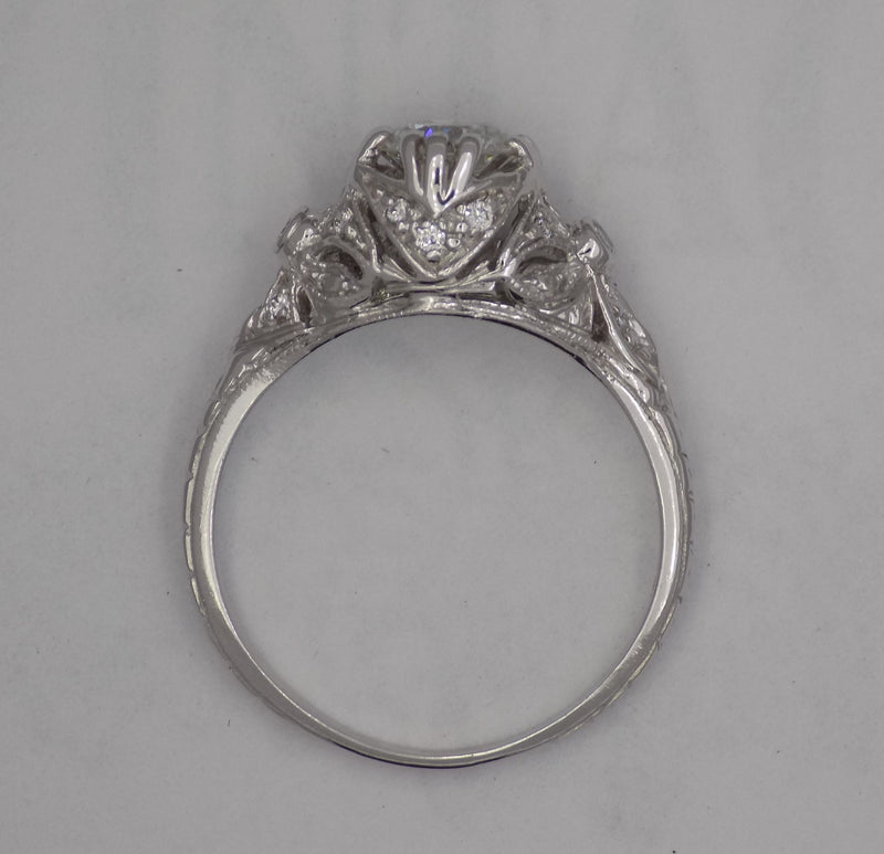 White gold filigree diamond wedding set.