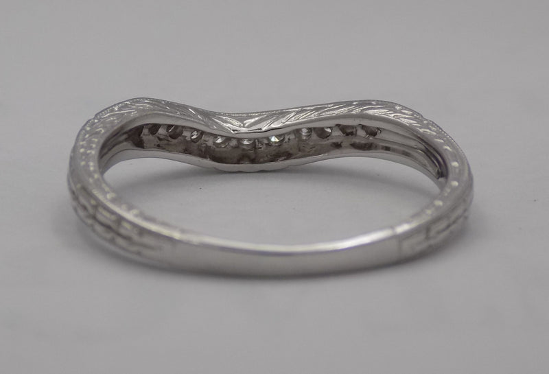 White gold filigree diamond wedding set.