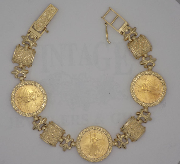 Yellow gold bracelet with (3) 1/10 American Gold Eagle coins.