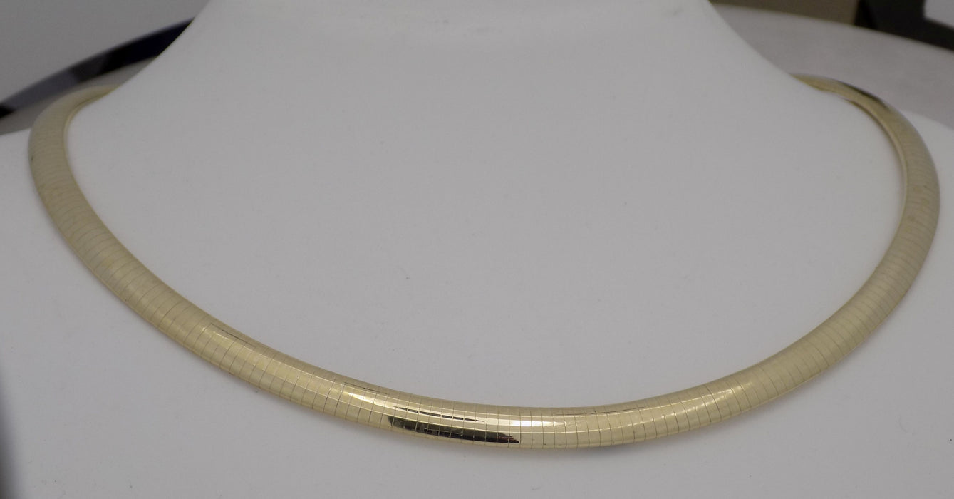 Yellow gold 16" domed omega necklace.