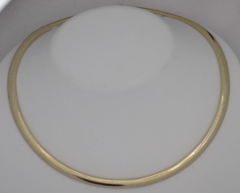 Yellow gold 16" domed omega necklace.