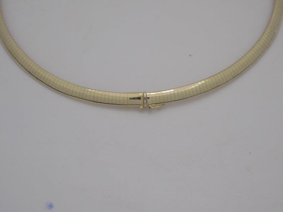 Yellow gold 16" domed omega necklace.