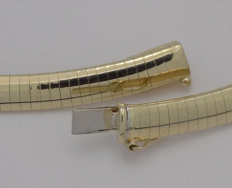 Yellow gold 16" domed omega necklace.