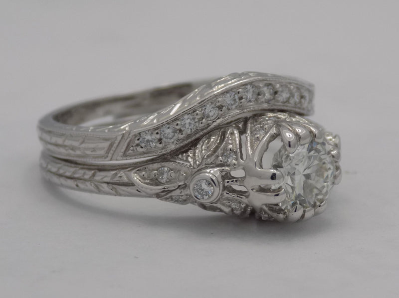 White gold filigree diamond wedding set.