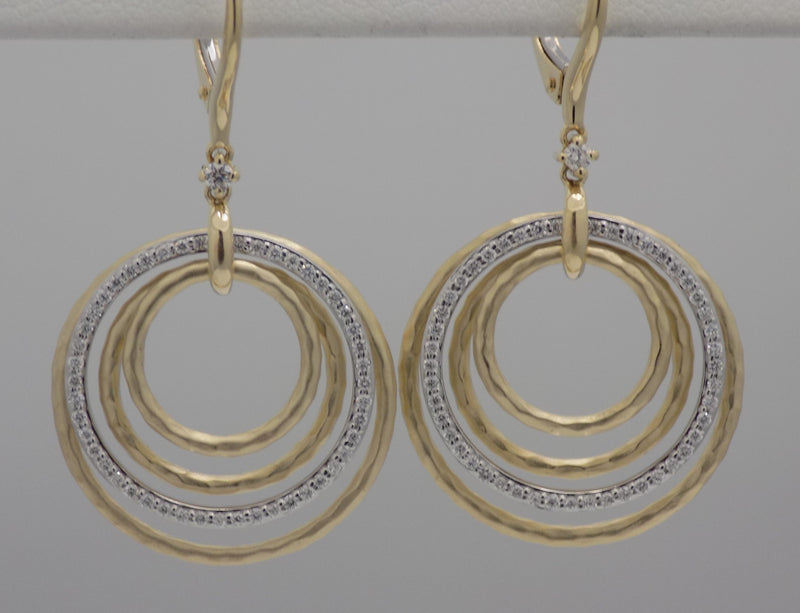 Two tone diamond stacked circle drop earrings.