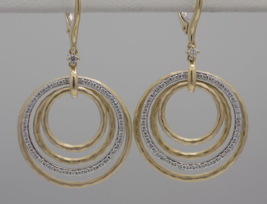 Two tone diamond stacked circle drop earrings.