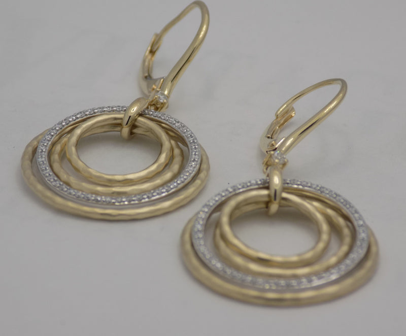 Two tone diamond stacked circle drop earrings.