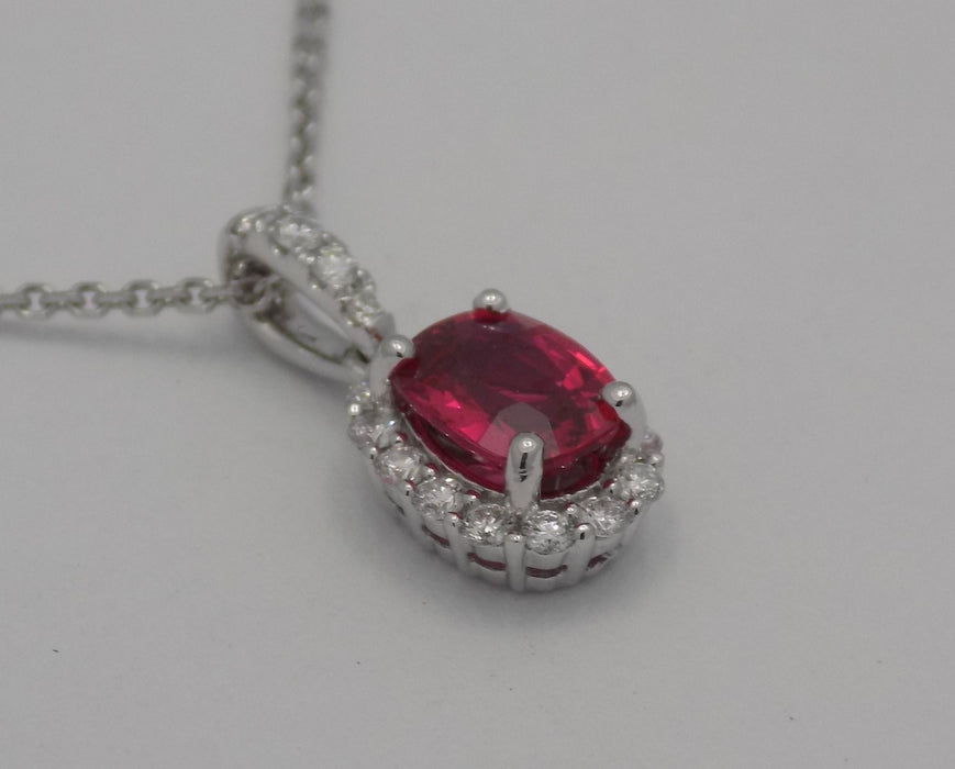 White gold natural spinel in a halo diamond pendant