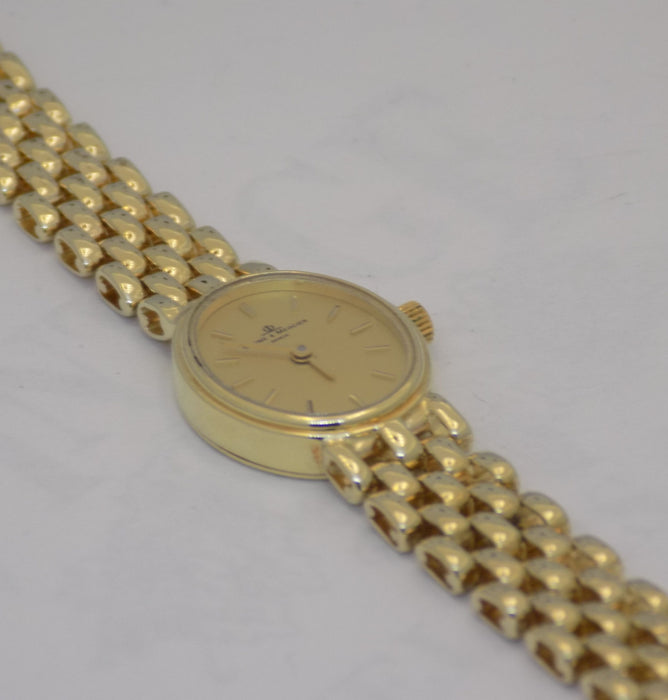 Yellow gold Baume & Mercier quartz wristwatch.