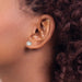 single (1/2 pair) 14 karat white gold 5.75 mm cubic zirconia stud pierced earring