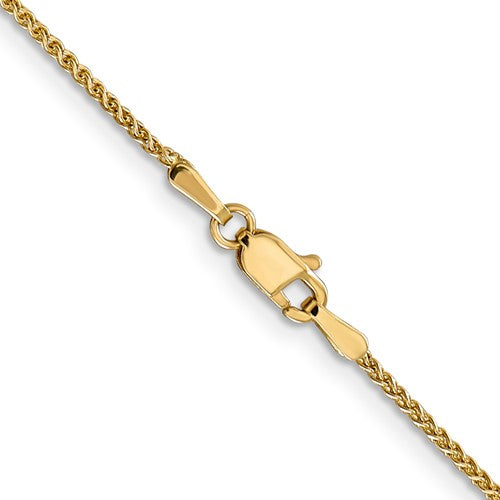 14 karat yellow gold flexible 1.25 mm, medium weight, spiga chain, also known as wheat chain, with lobster clasp.