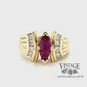 Revolving video of 14 karat yellow gold .95 carat marquise pink tourmaline and diamond ring