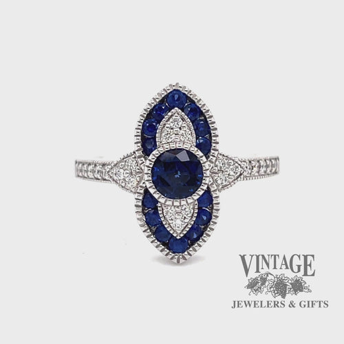Revolving video of 14 karat white gold .63 carat total weight natural blue sapphire and diamond ring
