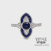 Revolving video of 14 karat white gold .63 carat total weight natural blue sapphire and diamond ring