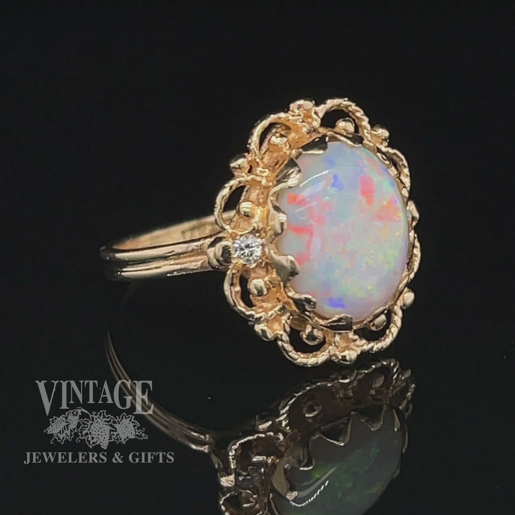 Revolving video of 14 karat yellow gold 2.25ct white opal estate ring