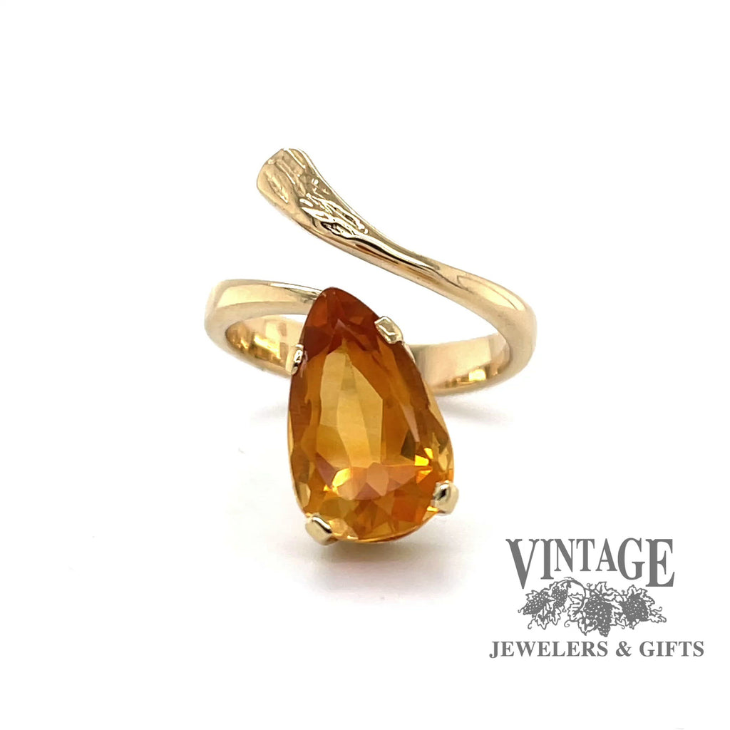 Revolving video of 14k yellow gold pear shaped citrine ring