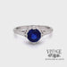 Revolving video of 14 karat white gold 1.15ct natural blue sapphire filigree solitaire ring