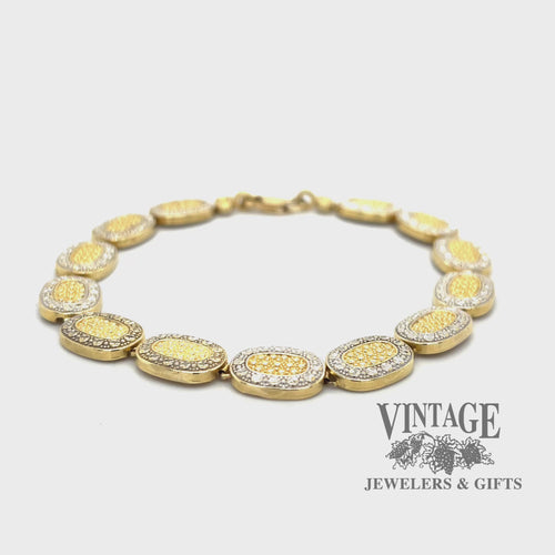 Two tone oval link embossed 14k gold 7.5" bracelet video