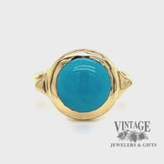 Revolving video of 18 karat yellow gold turquoise cabachon bezel set ring